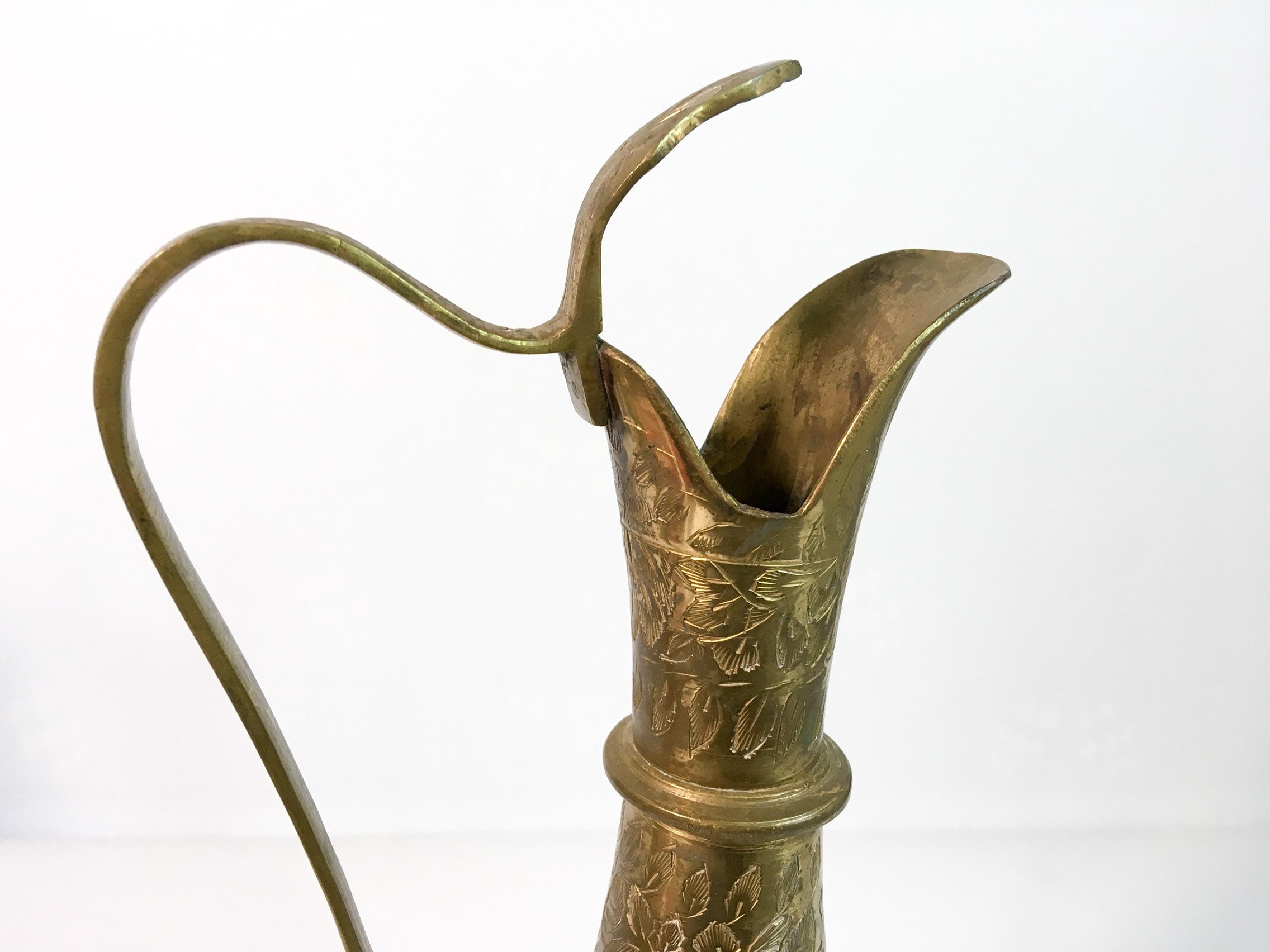 Vintage Tall Brass Tone Pitcher or Ewer With Embossed Floral / Leaf