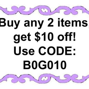 May include: A white rectangular sign with a purple decorative border at the top and bottom. The black text reads: Buy any 2 items, get $10 off! Use CODE: B0G010. The sign is presented on a plain white background with clear, bold lettering.