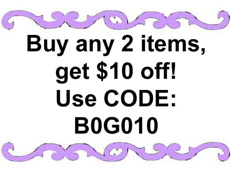 May include: A white rectangular sign with a purple decorative border at the top and bottom. The black text reads: Buy any 2 items, get $10 off! Use CODE: B0G010. The sign is presented on a plain white background with clear, bold lettering.