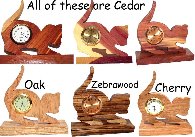 May include: Six wooden cat clock figurines, each made from a different type of wood. The woods are Cedar, Oak, Zebrawood, and Cherry.  All of these are Cedar.