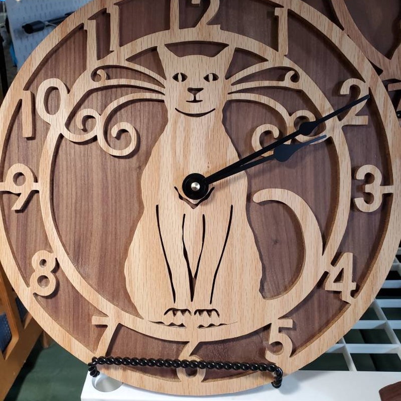Cat On Wall Clock