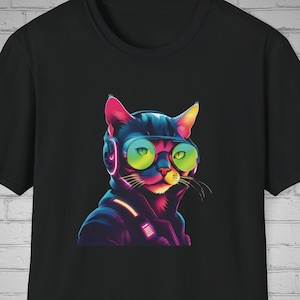 May include: Black t-shirt with a colorful graphic of a cat wearing headphones and sunglasses.