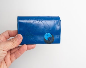 small purse made of truck tarpaulin blue with circles