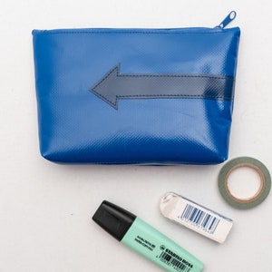 Práctico estuche de lona para camión con cremallera y flecha