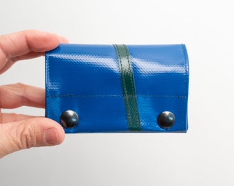 small purse made of truck tarpaulin blue with stripes