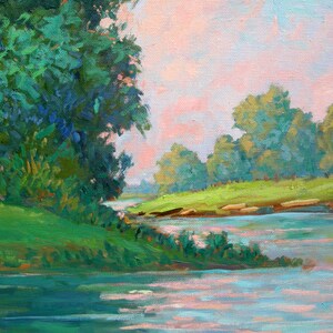 May include: A painting of a river scene with a lush green bank on the left side of the image. The river is a light blue color and the bank is covered in green grass and trees. The sky is a light pink color with a few clouds.