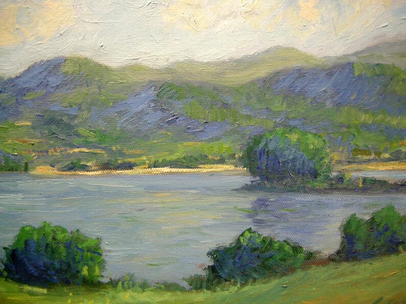 May include: Landscape painting depicting a tranquil lake scene.  The foreground shows lush green vegetation, while the mid-ground features a calm body of water reflecting the sky.  The background showcases rolling hills in varying shades of green and blue, painted with visible brushstrokes. The overall palette is soft and muted, with blues, greens, and light grays dominating the composition. The style suggests Impressionism or Post-Impressionism, with a focus on capturing light and atmosphere.