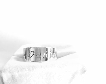 Silver hallmarked engraved ring . Don't worry be happy .