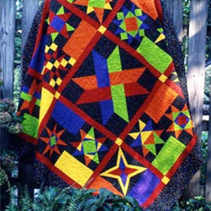 May include: A colorful quilt with a patchwork design featuring geometric shapes and stars in shades of red, yellow, green, blue, and black. The quilt is made with a variety of fabrics and textures.