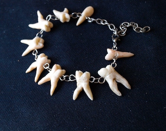 human tooth silver charm bracelet