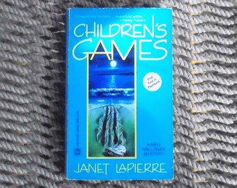 Children's Games - A Meg Halloran Mystery by  Janet Lapierre (1990)