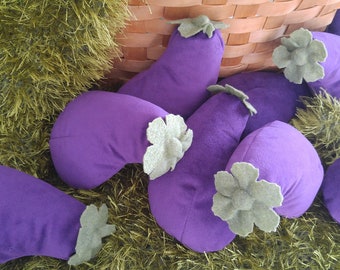 Eggplant catnip toys.