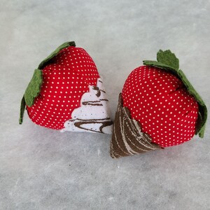 Two strawberry catnip toys. image 2