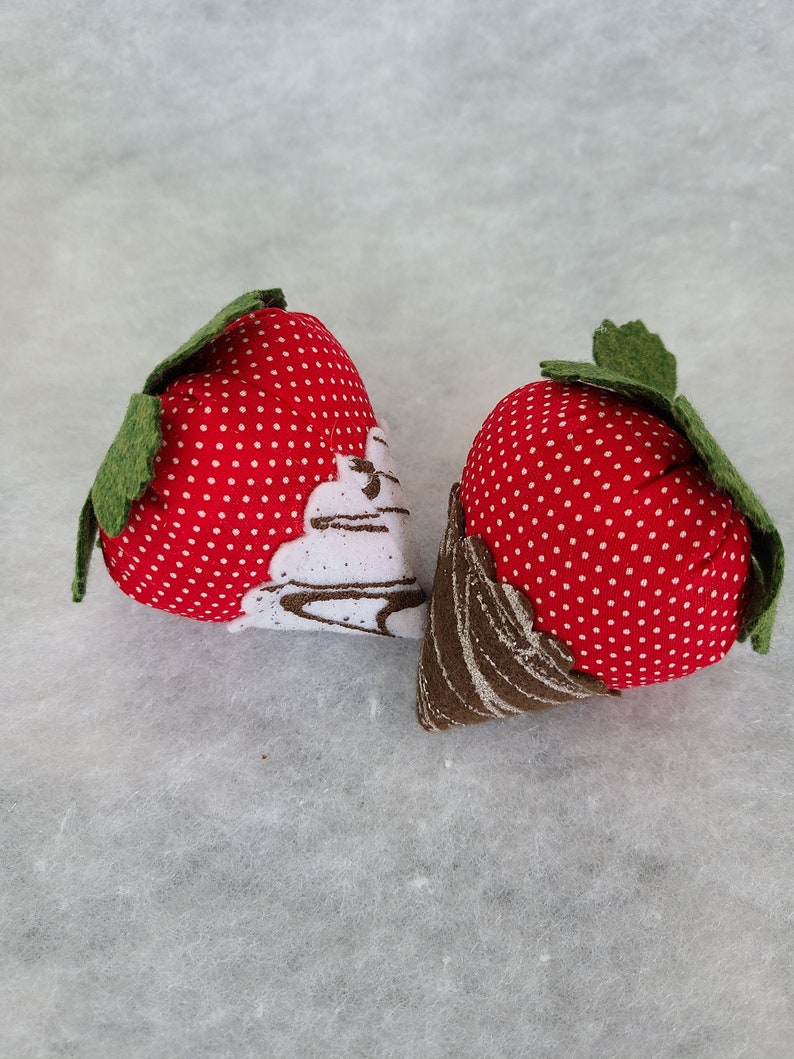 Two strawberry catnip toys. image 2