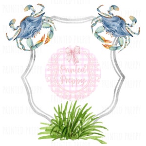 May include: A watercolour illustration of a crest with two blue crabs on either side. The crest is surrounded by a pink and white gingham pattern with a pink bow. The text "Printed Preppy" is written in the centre of the crest.