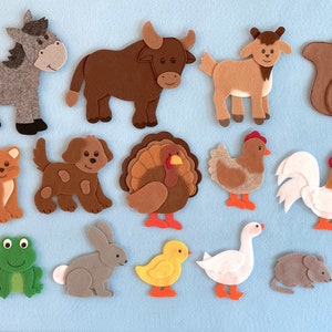 May include: Felt animal cutouts in various colors and shapes, including a donkey, bull, goat, squirrel, cat, dog, turkey, chicken, rooster, frog, rabbit, chick, goose, and mouse.