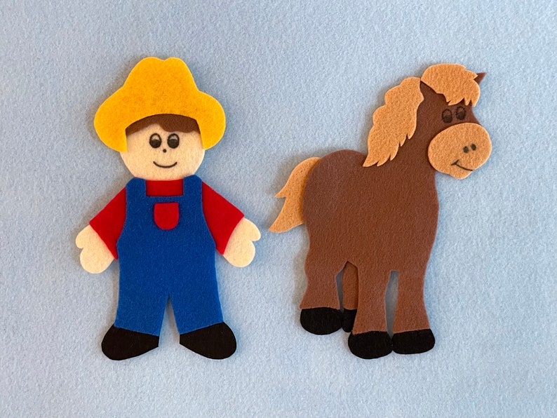 May include: A felt craft set featuring a brown horse and a person wearing blue overalls and a yellow hat.