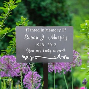 Black metal memorial plaque. Personalized with your custom text. Comes with metal stake for easy installation.