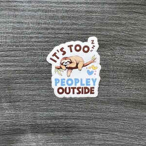 May include: A white sticker with a brown sloth sleeping on a branch with the text "It's too ZZZ" and "People outside".