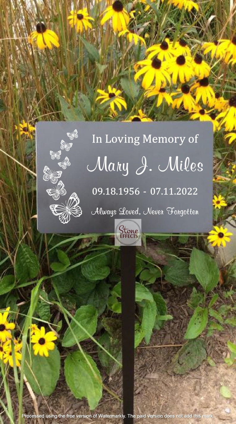 Custom engraved black metal plaque with butterfly design.  A beautiful addition to a memorial garden. Personalized text allowing for meaningful messages to be showcased. Includes stake for easy installation, the plaque can be easily displayed.