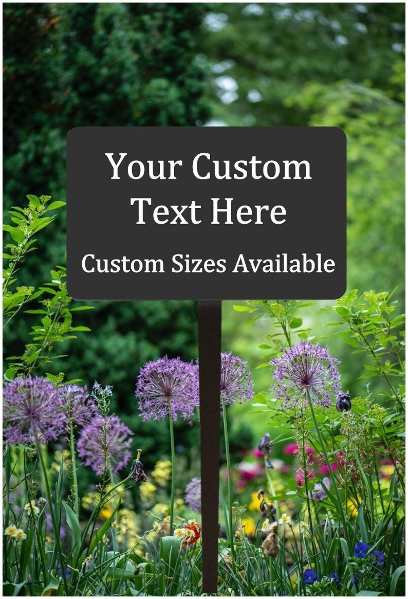 Black metal plaque with stake. Engraved with your custom text. Great for marking a variety of outdoor spaces