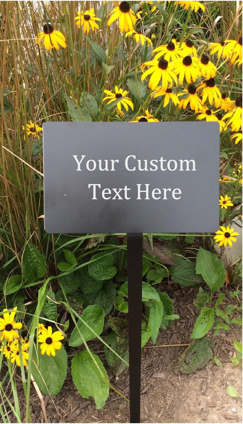 Black metal plaque. Custom engraved with your text. 8x5" with 25" stake.