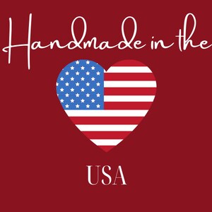 May include: Handmade in the USA text with a red, white, and blue heart-shaped American flag.
