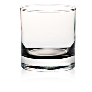 May include: A clear glass tumbler with a thick base. The glass is empty and has a slight reflection.