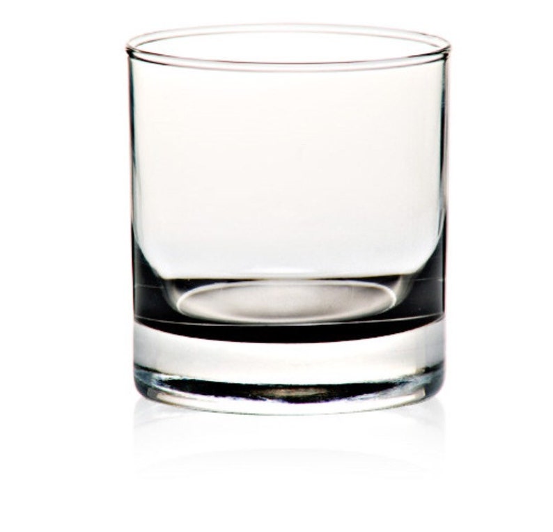 May include: A clear glass tumbler with a thick base. The glass is empty and has a slight reflection.