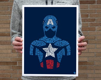 May include: A framed Captain America art print. The artwork features a silhouette of Captain America filled with words and phrases in white, blue, and red against a dark blue background. The words include "Steve Rogers", "Avenger", and "Captain America".