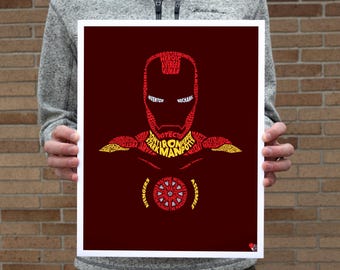 May include: A red and yellow word art print of Iron Man. The print features the words "Iron Man" in large letters, surrounded by smaller words related to the character, such as "Avengers", "Stark", and "Genius".