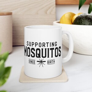 New Humorous 11oz Mug &quot;Supporting Mosquitos&quot; - Camping, Campfire, Camping in forest, campsite, camping theme, camping design, Gift Mug
