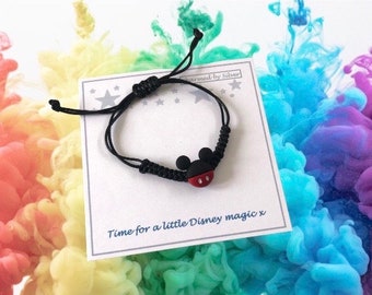 Pulsera tejida con temática de Mickey Mouse de Disney y mensaje