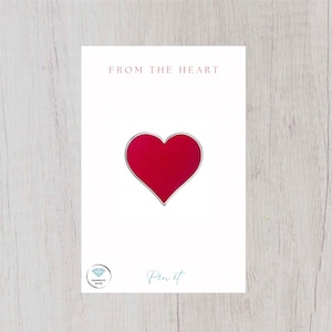 May include: Red enamel heart pin with a silver outline. The pin says "From the Heart" and "Pin it" on the card.