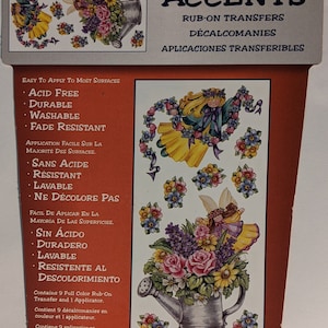May include: A set of nine full-color rub-on transfers featuring angels, flowers, and a watering can. The transfers are acid-free, durable, washable, and fade resistant. The set includes one applicator.  Indoor/Outdoor Accents.  Designed by Glenda Betz.