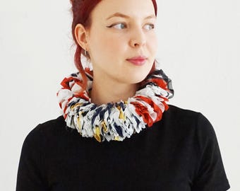 Ruff from organic cotton with handmade ribbons and beads balls