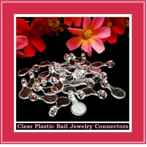 May include: A pile of clear plastic bail jewelry connectors. The connectors are small and have a loop on one end and a flat, round disc on the other.