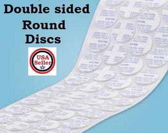 May include: A roll of 3/4 inch double-sided round discs. The discs are white and have a blue printed label. The roll is on a blue background. USA Seller.