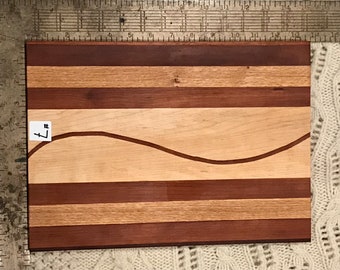 Handcrafted hardwood cutting board/cheeseboard