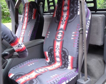 1 Set of Grey Aztec Print Seat Covers and the Steering Wheel Cover Custom Made.