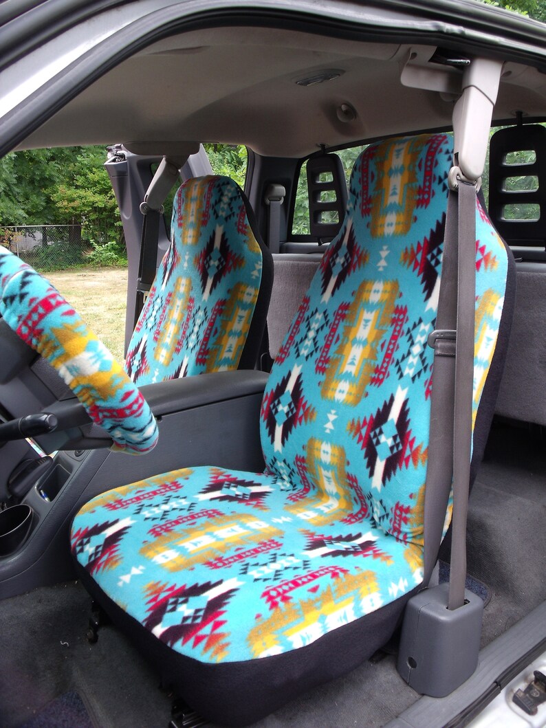 A Set Of Canyon Turquoise Native American Print Seat Covers And The Steering Wheel Cover Custom Made