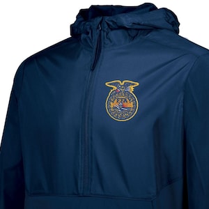 May include: Navy blue hooded jacket with a half-zip closure. The jacket features a gold and blue FFA emblem on the chest. The hood is attached, and the jacket appears to be made of a lightweight, water-resistant material.
