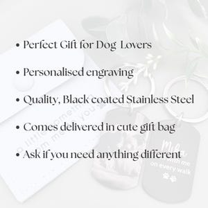 May include: Two black stainless steel dog tag keychains with silver rings. One tag features a photo engraving, the other has the text 'Mika, still with me on every walk' with paw prints. Text on image: Perfect Gift for Dog Lovers, Personalised engraving, Quality, Black coated Stainless Steel, Comes delivered in cute gift bag, Ask if you need anything different.