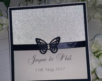 Wedding Invites - The Sparkly Collection - Silver Sparkly Card with Navy Card & Matching Ribbon with Butterfly