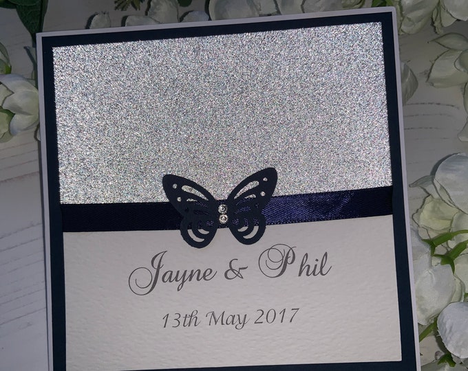 Wedding Invites - The Sparkly Collection - Silver Sparkly Card with Navy Card & Matching Ribbon with Butterfly