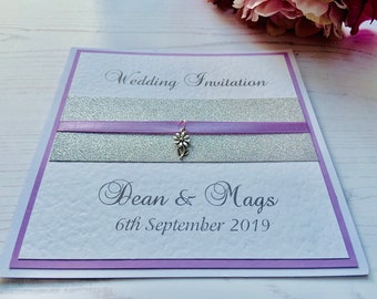 Wedding Invites - Lilac Ribbon with Silver Daisy Charm - Side Fold Card with Envelope