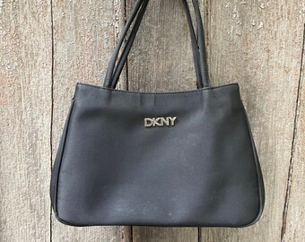 dkny leather handbolsa