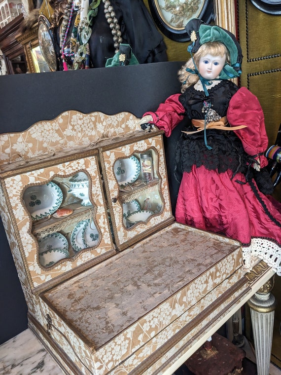 Antique doll display case hotsell