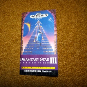 May include: A Sega Genesis game cartridge instruction manual for Phantasy Star III: Generations of Doom. The cover features a blue-clad character ascending a staircase towards a figure in a white robe.