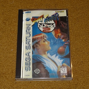 Custom printed Sega Saturn Street Fighter Alpha 2 manual, and case insert (Select &#39;man, ins & case&#39; for Cases)